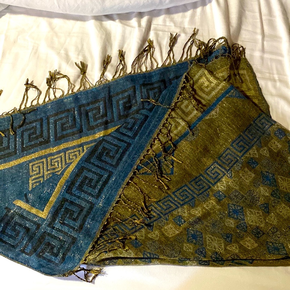 Blue and gold shimmery wrap/scarf. Perfect for casual or formal wear. Super soft
